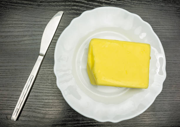 istock A cube of butter on a plate. 901194900