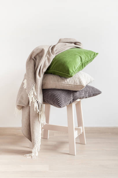 istock gray and green cushions cozy home 901195836