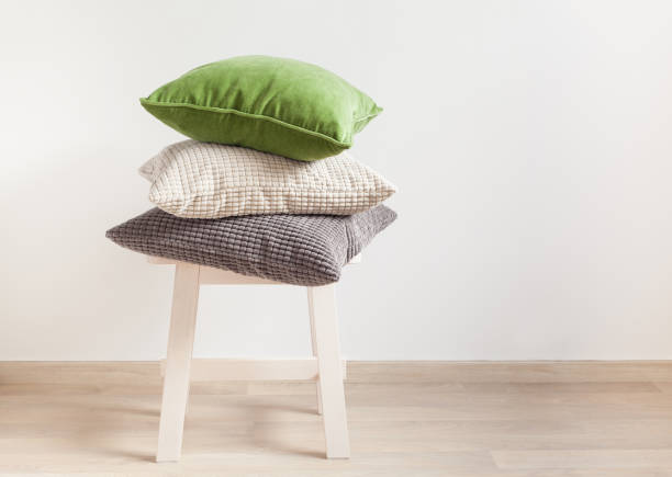 istock gray and green cushions cozy home 901198340