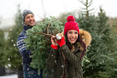 Couple buying Christmas tree