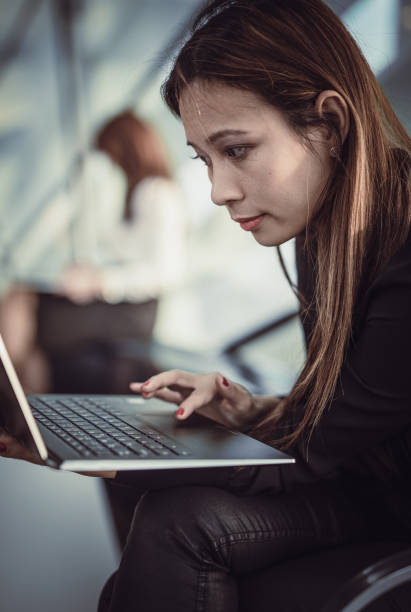 istock Businesswoman Working on Laptop 901203192