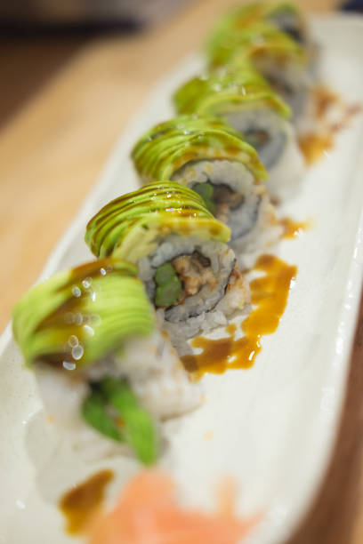 istock Tasty appetizing uramaki sushi roll (selective focus) 901203606