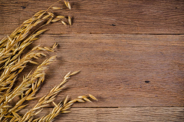 istock Oat cereal grain on wooden board background 901211458