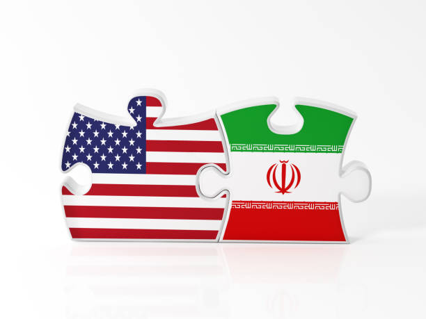 istock Jigsaw Puzzle Pieces Textured With American And Iranian Flags 901211916