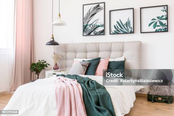 Gallery Of Posters In Bedroom Stock Photo - Download Image Now - Apartment, Bed - Furniture, Bedding