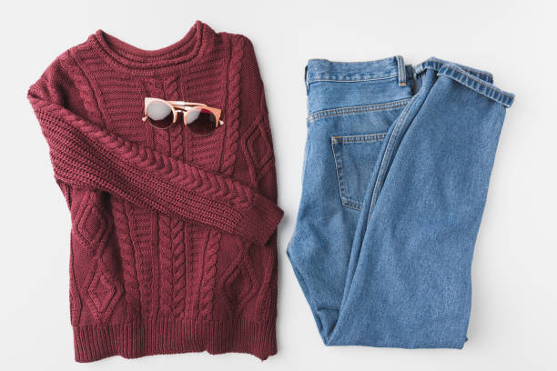 istock knitted sweater, jeans and sunglasses 901219384