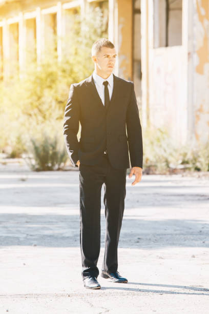 istock Awesome stylish men in elegant suite posing. Elegance and Luxury Man concept. 901224110