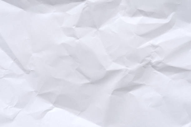 istock White crumpled paper background and texture 901224208