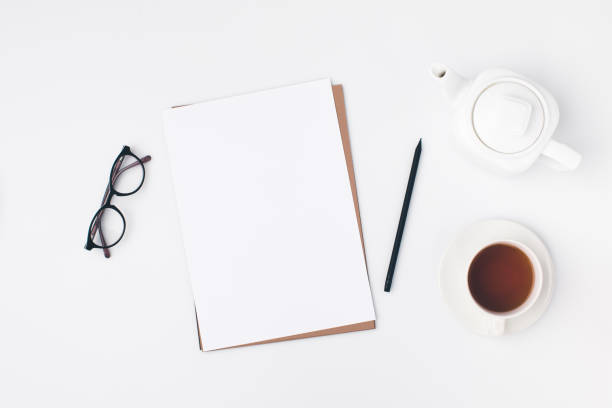 istock blank paper with cup of tea 901228840