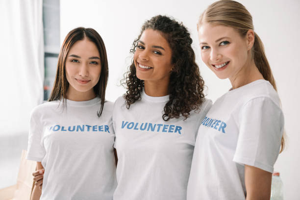 istock multiethnic female volunteers 901228916