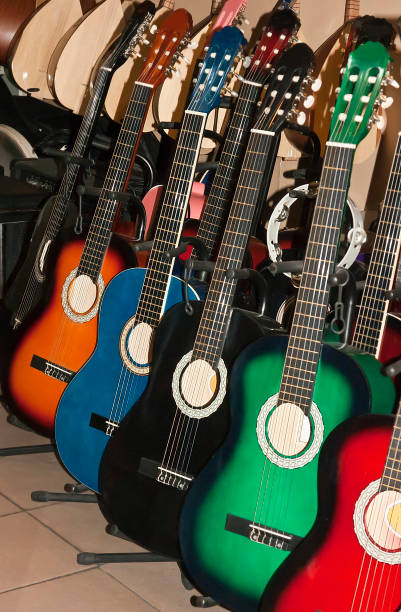 istock Many colorful acoustic guitars 901232102