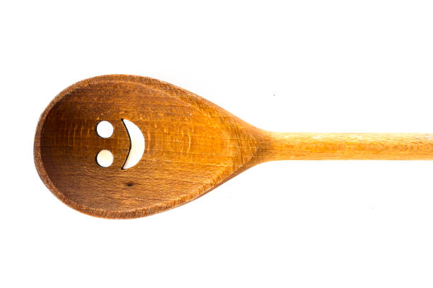 Wooden spoon isolated on white background