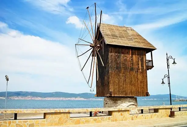 Photo of A wooden windmill at the entrance to the Old town of Nesebar