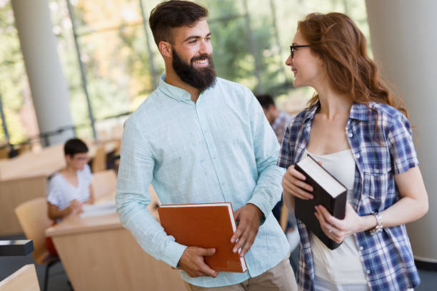istock Group of college students working together in the school 901257544