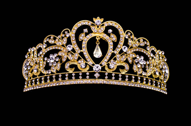 corona de oro sobre fondo negro - hair clip fotos fotografías e imágenes de stock