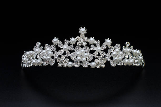 istock tiara with pearls isolated on a black background 901258056