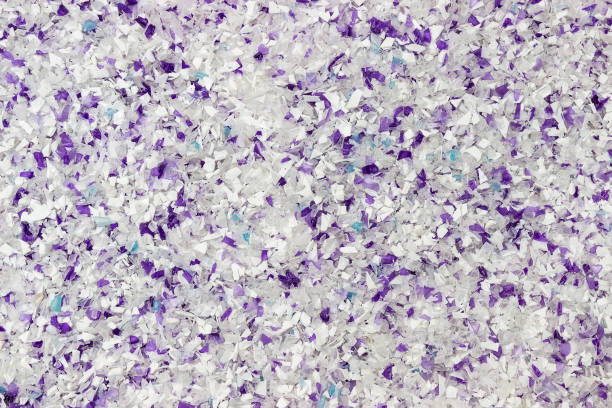 Recycled plastic bottles. Polymeric pellets.  Polymer beads. Polyethylene granules.