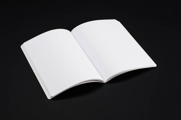 istock Mock-up magazines, book or catalog on black table background. 901260824