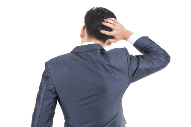 istock Asian Businessman standing on White Background with Problem. People Business Concept, isolated on white background. 901264376