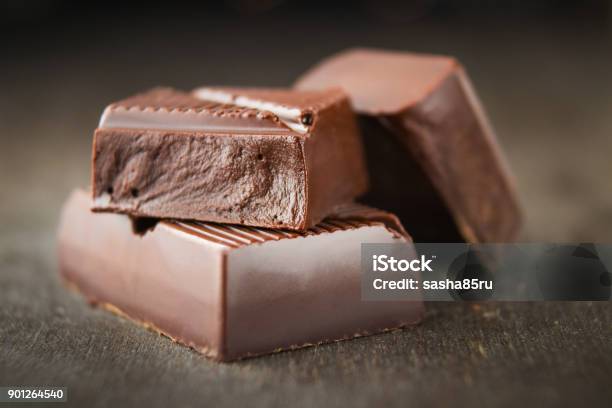 Chocolate Bars On A Wooden Background Stock Photo - Download Image Now - Milk Chocolate, Above, Addiction