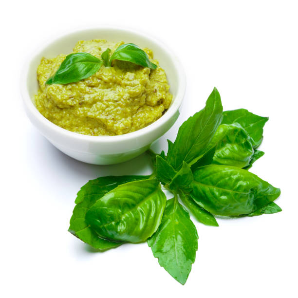 istock Pesto Sauce with Basil on White Background Studio shot 901266290