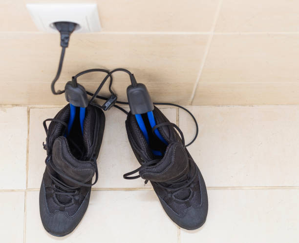 istock Winter boots with electric shoe dryer. 901272670