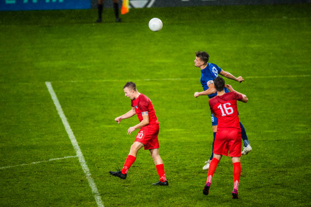 istock Soccer player heading the ball 901280320