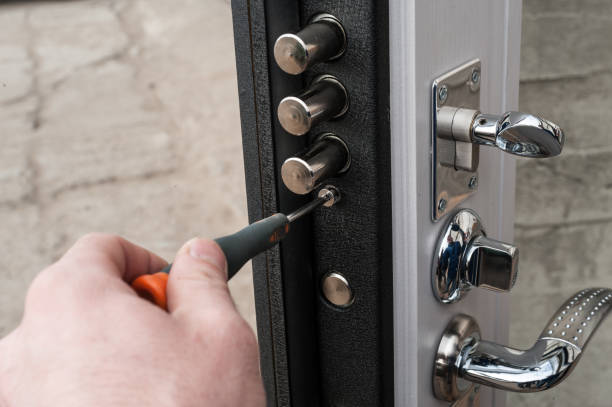 istock lock in a metal black door 901280720