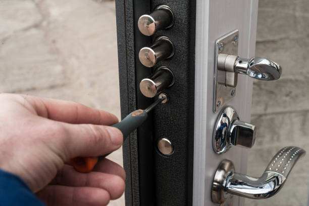 istock lock in a metal black door 901280824