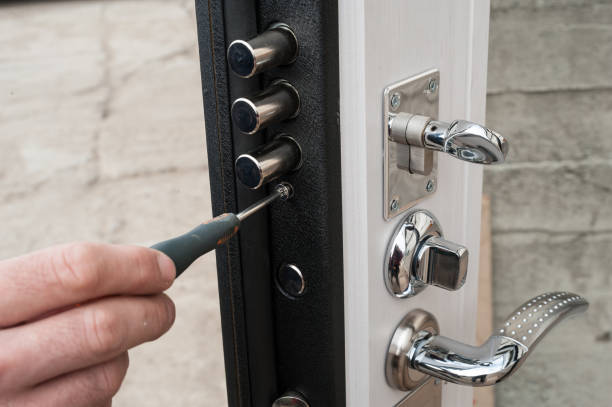 istock lock in a metal black door 901280988