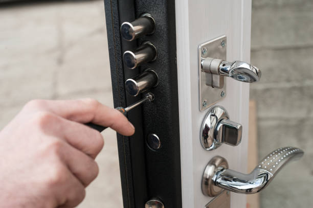istock lock in a metal black door 901281162