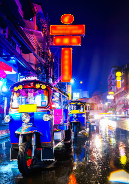 Tuk Tuk taxi in china town Tuk Tuk taxi in china town bangkok at the night bangkok street stock pictures, royalty-free photos & images