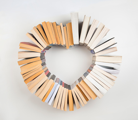 Heart shape from books, top view.