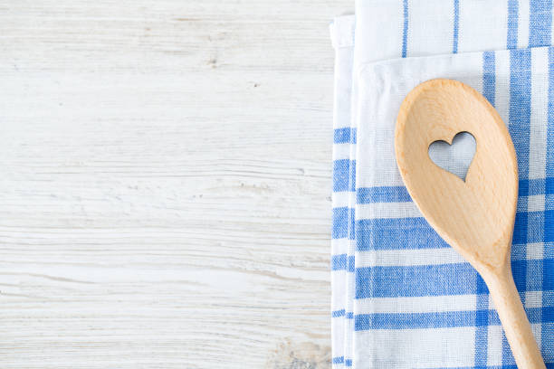 istock wooden spoon with heart on kitchen towel 901284628