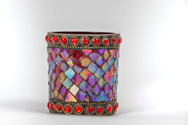 Close-Up Of Tea Light Over White Background