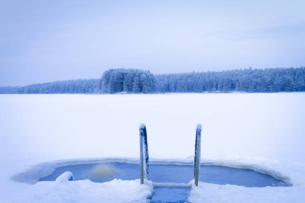 istock ice swimming place. Kuhmo, Finland. 901285508