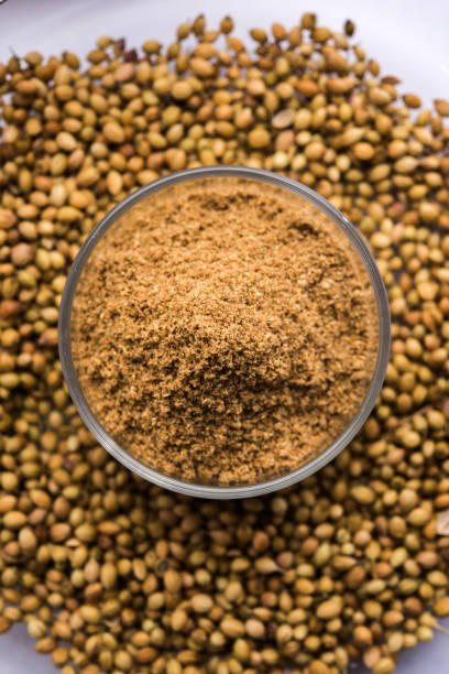 Indian spice coriander powder heap, selective focus