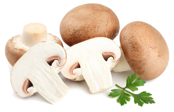 istock Fresh champignon mushrooms isolated on white background 901311994
