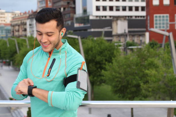 istock Wearable innovative technology used while exercising outdoors 901312140