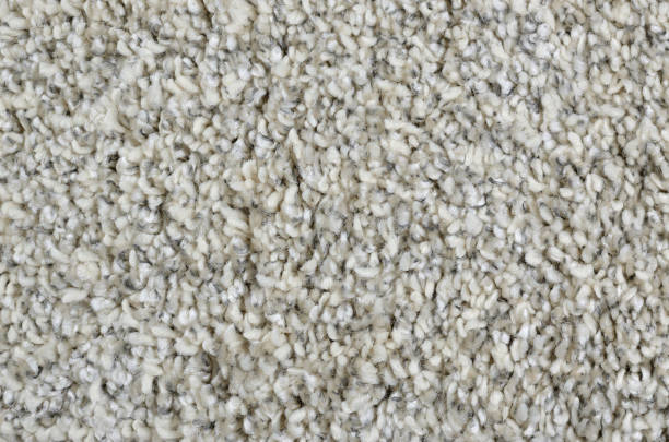 Close-up of woolen carpet Close-up of grey woolen shaggy carpet surface shag rug stock pictures, royalty-free photos & images