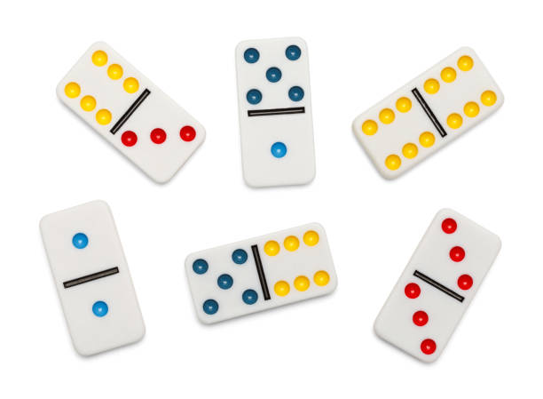 Scattered Dominos Dominoes Game Pieces Isolated on White Background. domino photos stock pictures, royalty-free photos & images