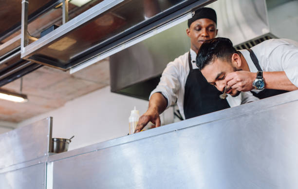 istock Professional chefs cooking delicious food 901317936