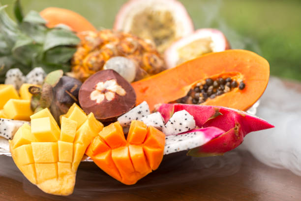 istock Exotic fruits in a smoke 901323324