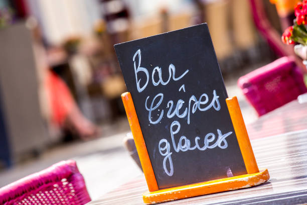 istock Small black board menu indicating bar, ice-creams and pancakes (