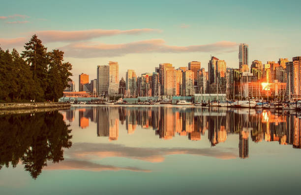 istock Vancouver skyline with Stanley Park at sunset, British Columbia, Canada 901329794
