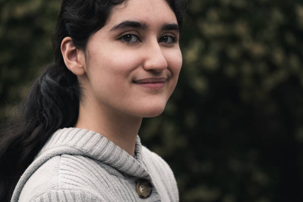 istock Young Latin Woman looking at Camera 901362356