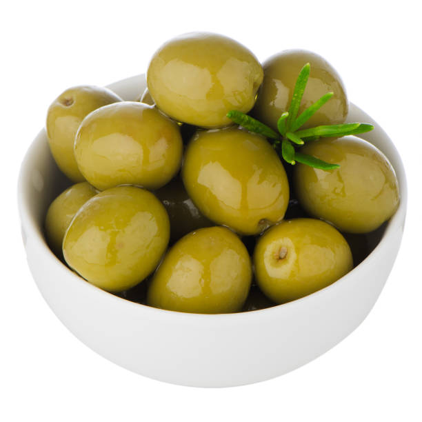 istock Green olives in a white ceramic bowl 901362778