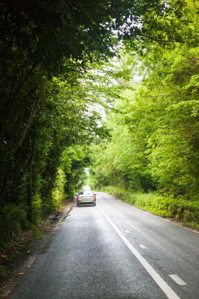 istock Car Driving on a Road in Rural Ireland 901366034