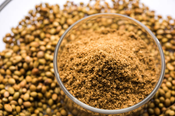istock Indian spice coriander powder heap, selective focus 901366042