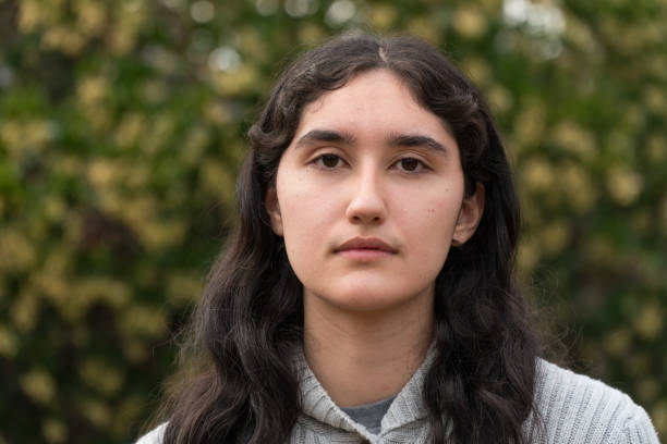 istock Young Latin Woman looking at Camera 901366098
